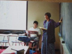 I teaching Latin, in schoolmarm garb.