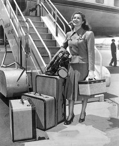 woman-with-suitcases-in-airport-0636a5184c1670f4514954228afaf8d5