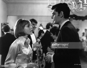 Tina (Carrie Snodgrass) at party with her husband (Richard Benjamin) in "Diary of a Mad Housewife"